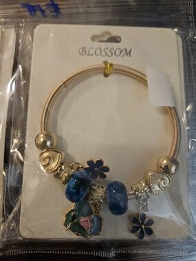 Blossom Gold-Tone Bracelet with Blue and Pink Charms